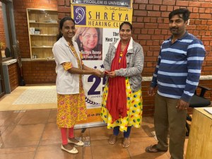 Group photo of patients and staff at Shreya Hearing Clinic